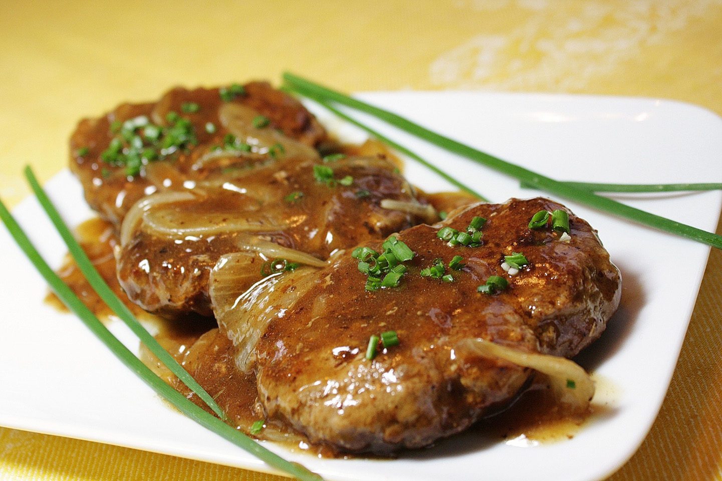 HAMBURGER STEAK WITH ONIONS AND GRAVY